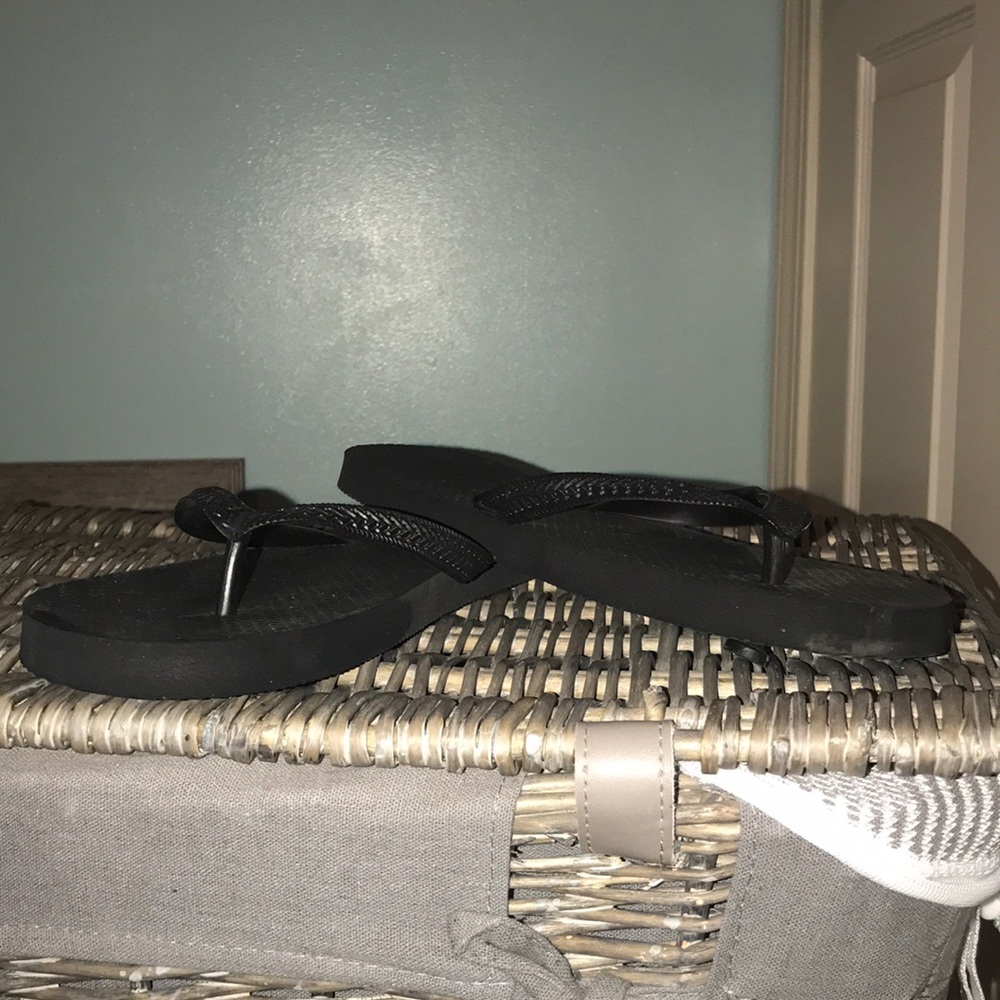 Black flip flops